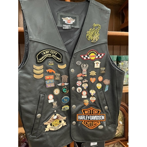 169 - A gents leather Harley Davidson waistcoat, Large size, with 6 various Harley Davidson and motorcycli... 