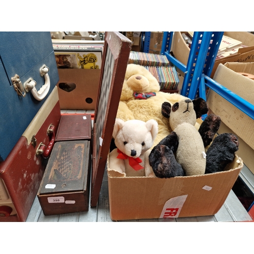 398 - Two chess sets, a chess board and a vintage panda toy and other soft toys