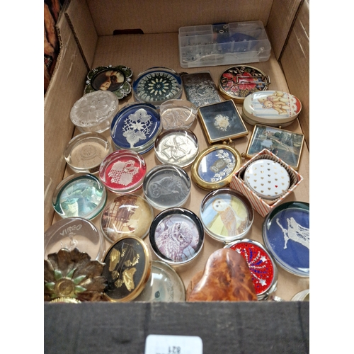 452 - A box containing various glass paperweights etc.