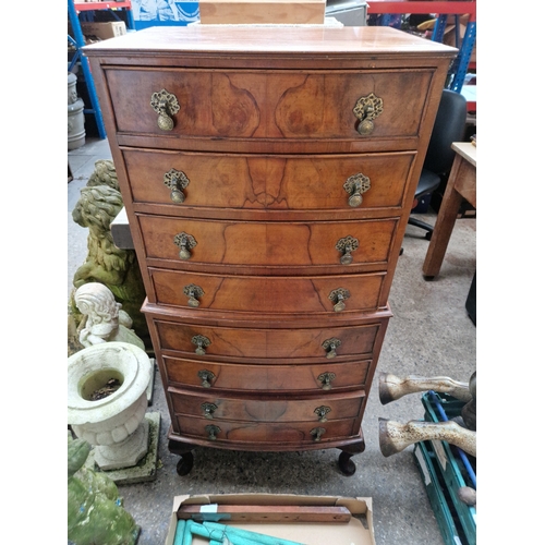 1064 - A 1930s walnut tallboy chest of drawers.