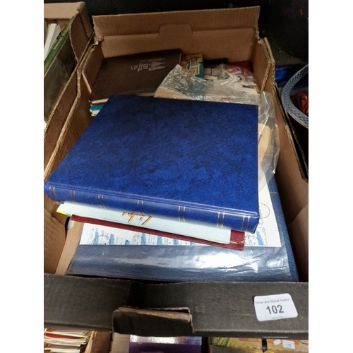 102 - A box of assorted stamp albums