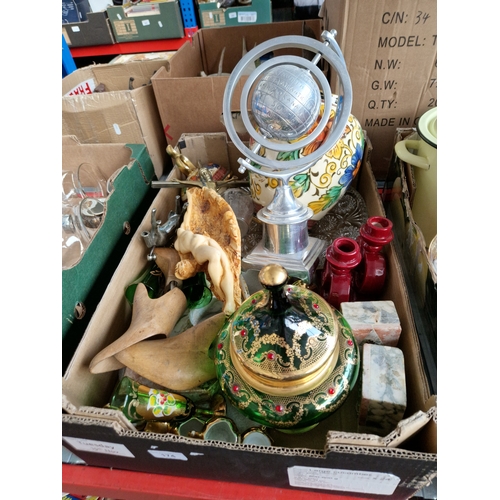 174 - A box of misc items to include brass crucifix, vintage shoe trees, aluminium globe on a stand, marbl... 