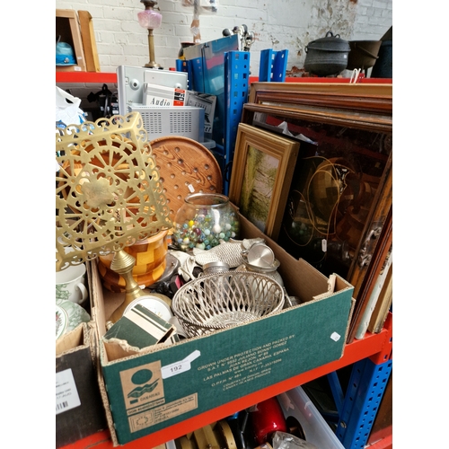 192 - A box of mixed items including treen, bowl containing marbles, pewter ware, metal ware, pictures and... 