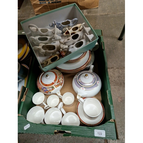 122 - A box of ceramics including Wedgwood Colorado and a box of cow creamers