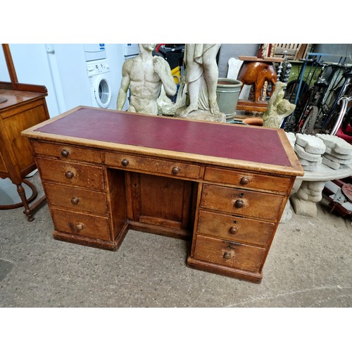 1072 - A leather topped pine desk