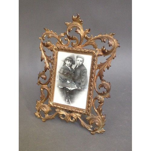 221 - A gilt metal frame photo frame 20cm x 28cm.