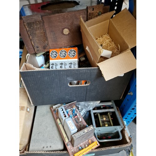 173 - 6 shelves containing approx 30 boxes of radio components, books, magazines, communications receiver,... 