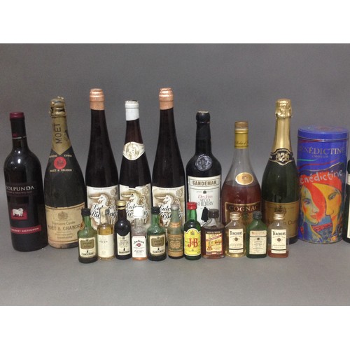 60 - A box of assorted alcoholic beverages including wines, spirits and whiskey miniatures.