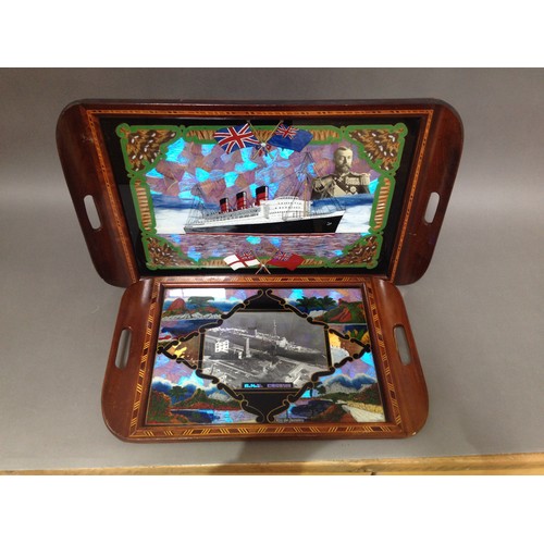 94 - Two Rio de Janeiro butterfly wing trays, one depicting the Queen Mary and the other HMS Caronia, len... 