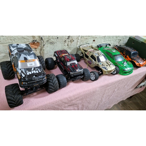 338 - Five assorted RC model vehicles.