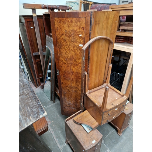 1006 - A 1930s Art Deco walnut bedroom suite comprising wardrobe, dressing table, tallboy, bedside cabinet ... 