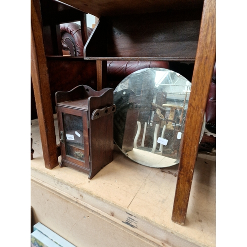 1016 - A small smokers cabinet together with a vintage mirror