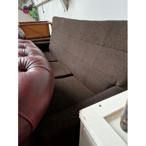 1019 - A retro mid 20th century three seater settee, length 280cm.