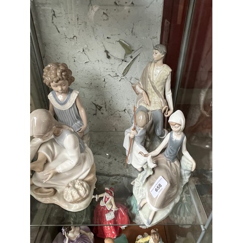 658 - Three Lladro figures and two Nao figures