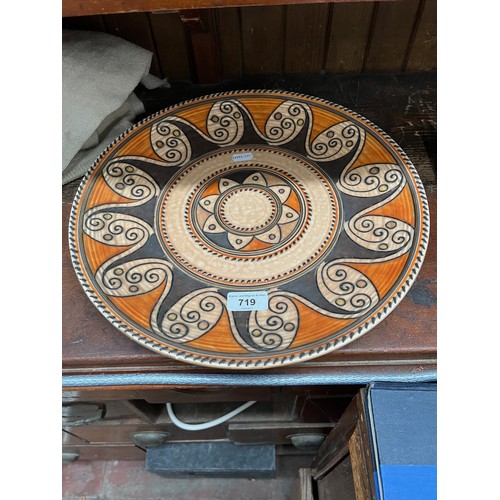 719 - A Charlotte Rhead charger.