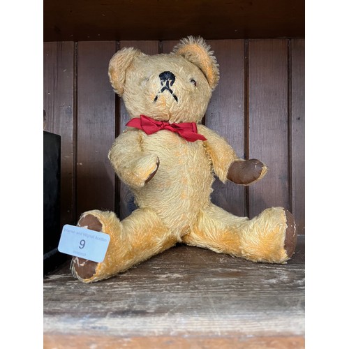 9 - A wind up musical teddy bear