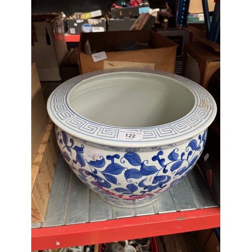 122 - A box with quantity of Fleurette tableware and a large blue and white planter.