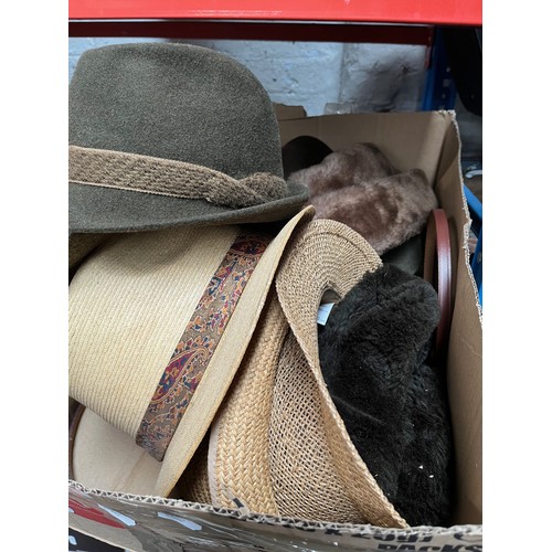 94 - A box of various hats to include Dunn & Co, straw hats, etc.