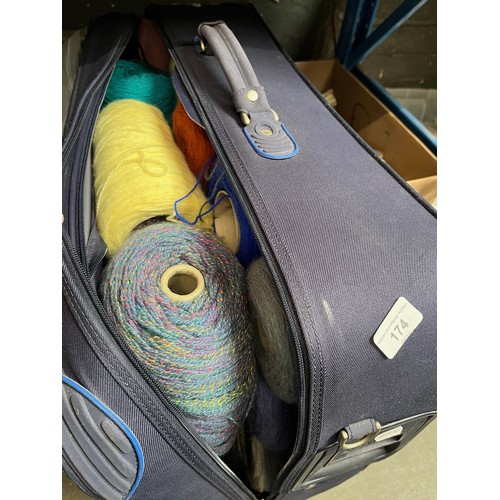 174 - A suitcase of machine knitting wool.