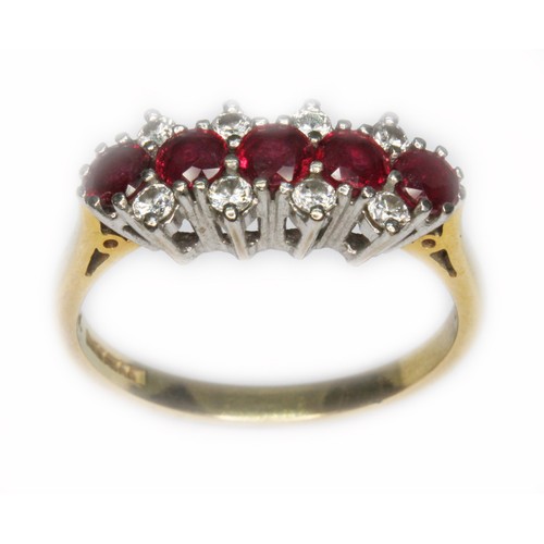 33 - A ruby and diamond cluster ring, hallmarked 18ct gold, sponsor 'B&S', Birmingham 1989, gross wt. 3.6... 