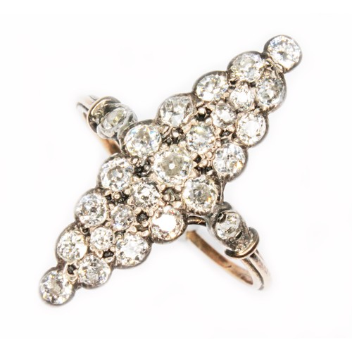 41 - An antique diamond cluster ring, the navette shaped cluster set with 23 old cut diamonds measuring a... 