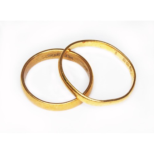 53 - Two hallmarked 22ct gold wedding bands, wt. 5.1g, size K & Q.