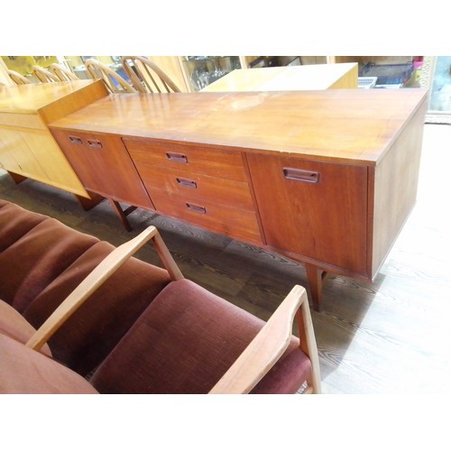 342 - A mid 20th century teak sideboard, length 181cm.