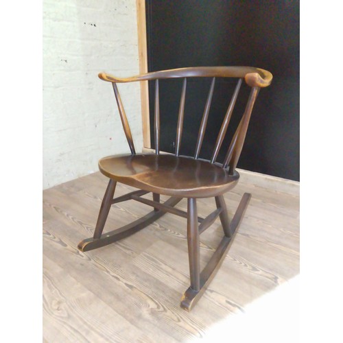 337 - An Ercol Cow Horn rocking chair.