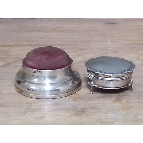 270 - A hallmarked silver pin cushion and trinket box.