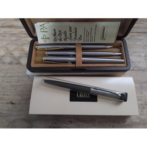 312 - Vintage pens and pencils comprising a brushed steel Parker trio comprising fountain, ballpoint and p... 