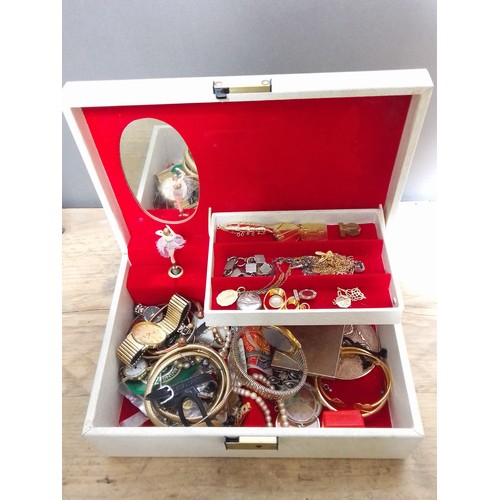 297 - A jewellery box and contents including gold and silver jewellery, watches etc.