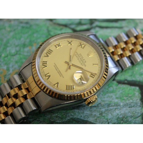 102 - A Rolex Datejust 36, circa 1995, ref. 16233, serial no. W673667, signed gold tone dial with gold Rom... 