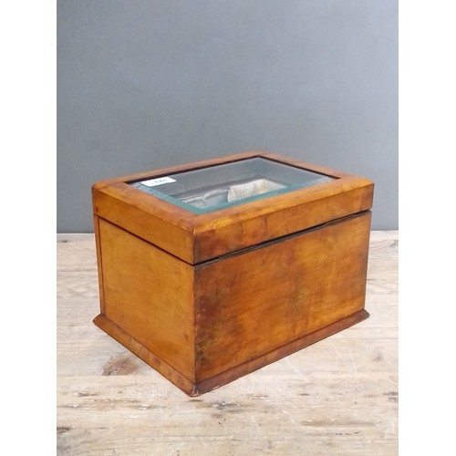 323 - A late 19th century walnut jewellery box, bevelled glass top, opening to reveal padded well, bevelle... 