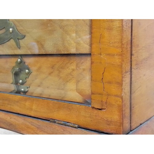 323 - A late 19th century walnut jewellery box, bevelled glass top, opening to reveal padded well, bevelle... 