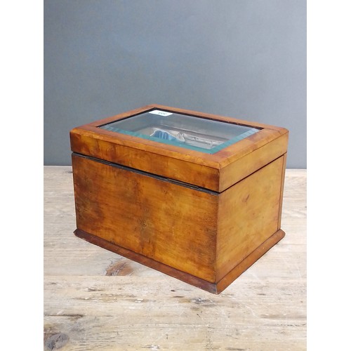 323 - A late 19th century walnut jewellery box, bevelled glass top, opening to reveal padded well, bevelle... 