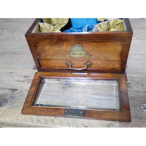 323 - A late 19th century walnut jewellery box, bevelled glass top, opening to reveal padded well, bevelle... 