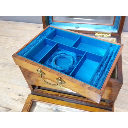 323 - A late 19th century walnut jewellery box, bevelled glass top, opening to reveal padded well, bevelle... 