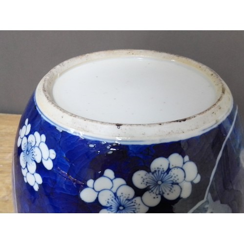 314 - A Chinese blue and white porcelain ginger jar with carved hardwood cover and stand, unmarked, 18th/1... 