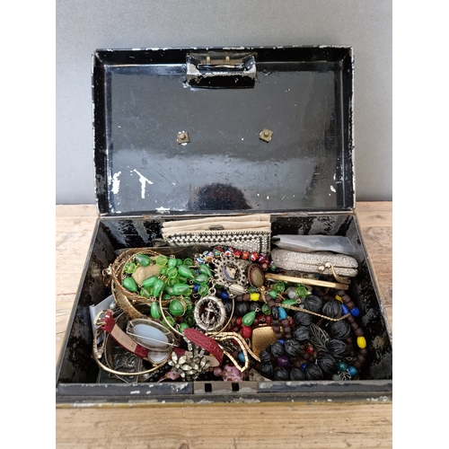 361 - A metal deed box containing various antique and modern jewellery to include brooches, chains, neckla... 