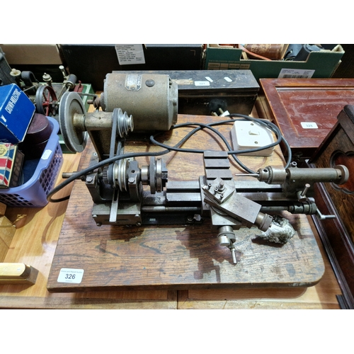 326 - A watchmaker's lathe with Fracmo motor.