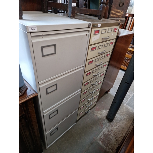 940 - Two sets of grey metal filing drawers.