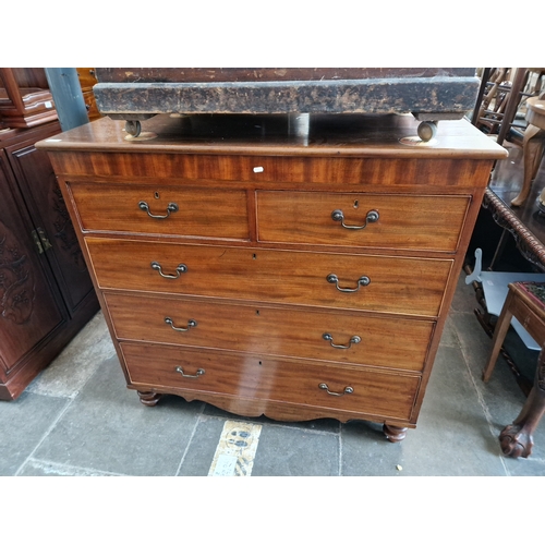 942 - A 19th century mahogany chest of drawers.