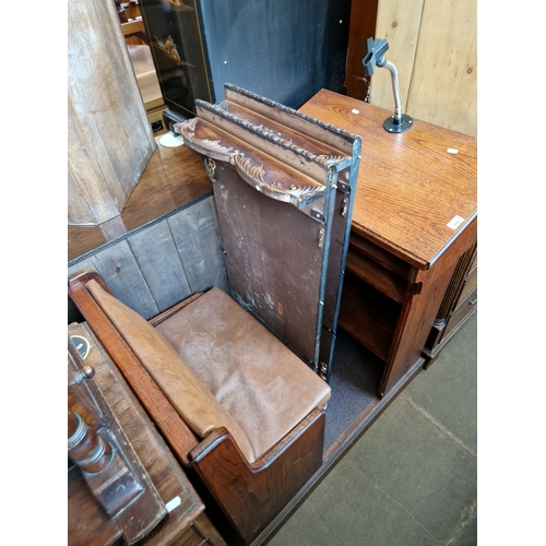 948 - An oak pew with microphone stand.