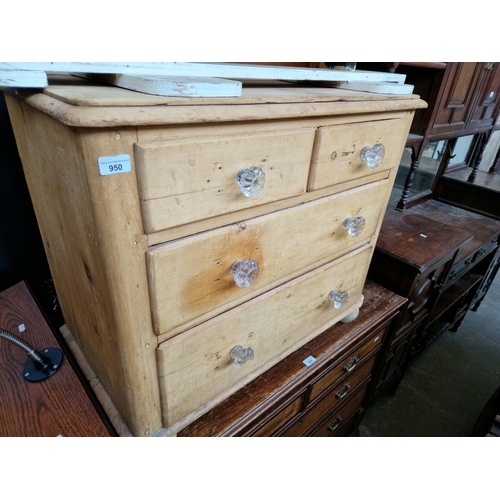 950 - A Victorian pine chest of drawers with pressed glass handles.