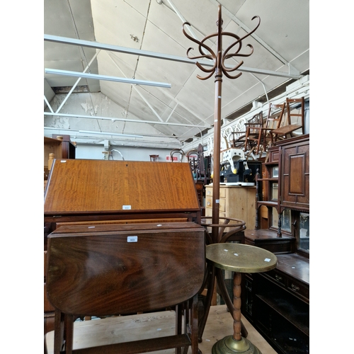 955 - Three pieces of furniture; a mahogany Sutherland table, a brass top occasional table and a bentwood ... 