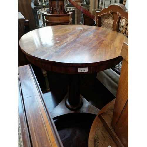 958 - A 19th century rosewood pedestal table.