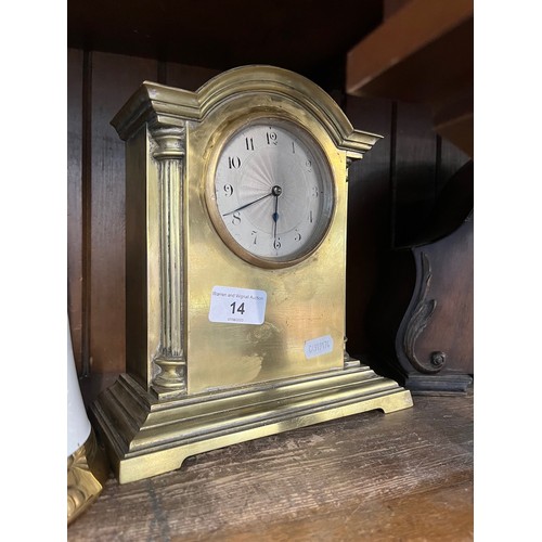 14 - A French brass mantle clock.