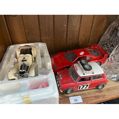 26 - Three model cars - SS Jaguar (Frankland Mint), Ferrari F40, and a Raleigh Mini Cooper S