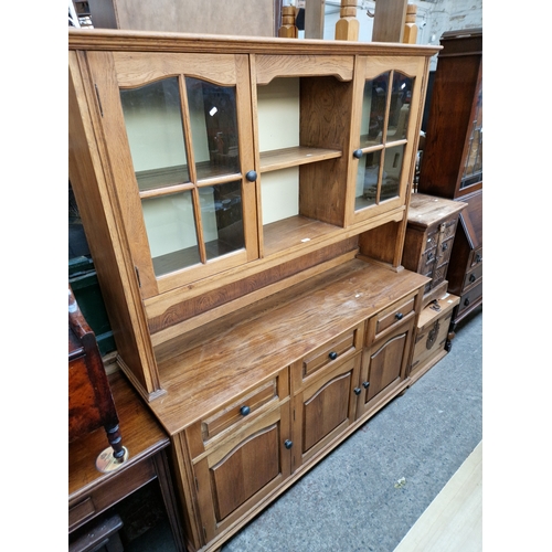 972 - A glazed oak dresser.