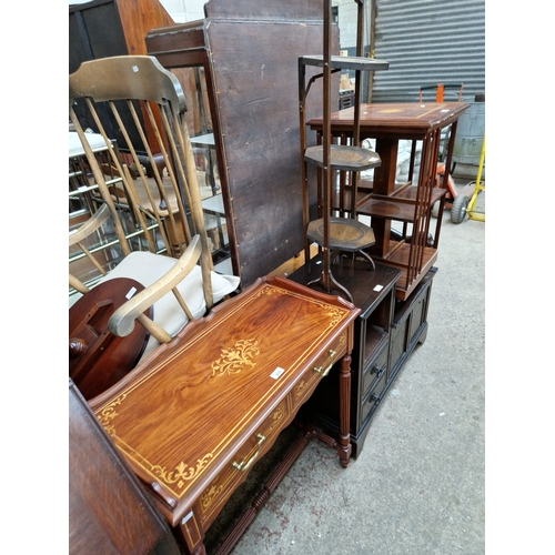 975 - An inlaid side table, an oak telephone seat and a folding cake stand.